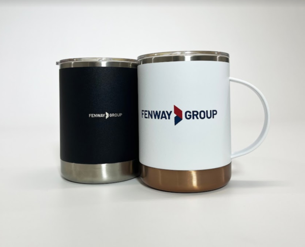 Two double insulated mugs with plastic slide tops. There is one black cup, laser engraved with Fenway Group's logo, and a white cup with copper accents with a full color imprint of the Fenway Group logo.