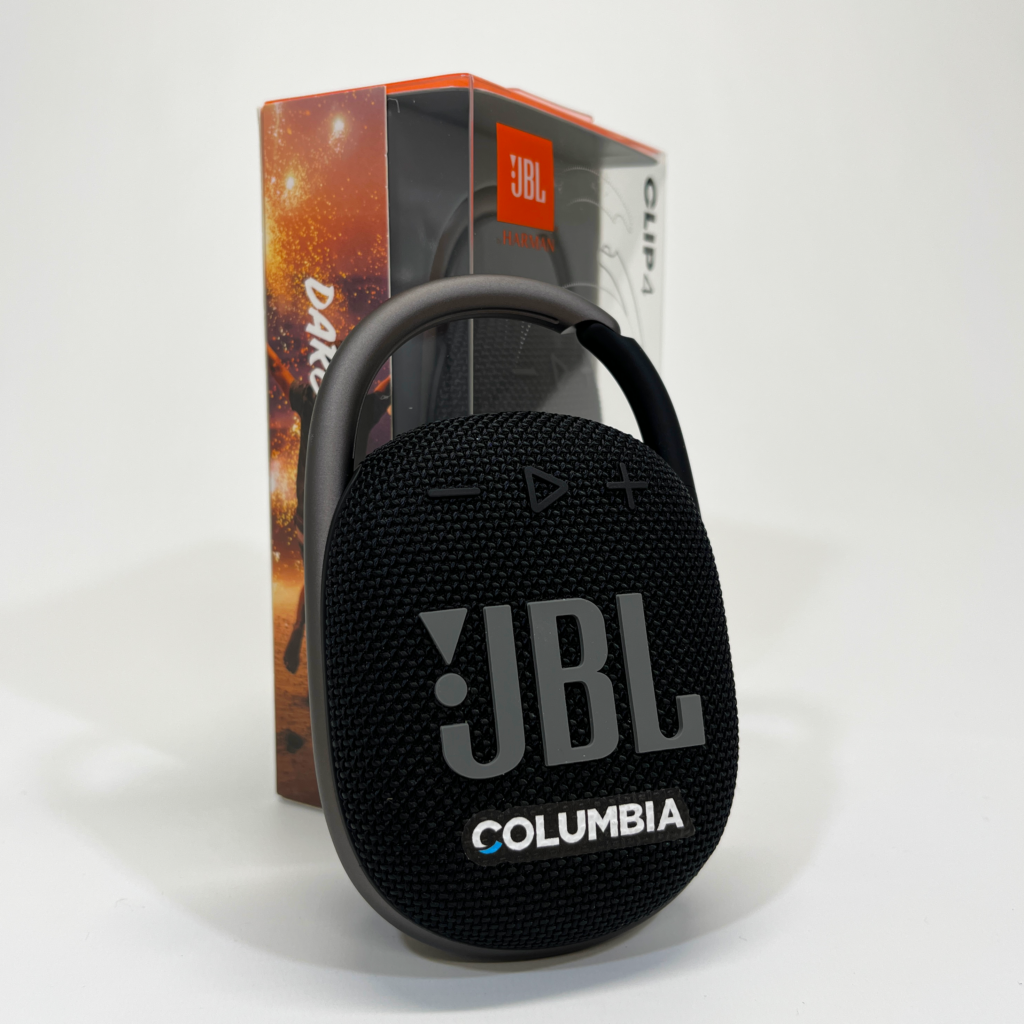 Promotional technology Branded bluetooth speaker with Columbia's logo on it.